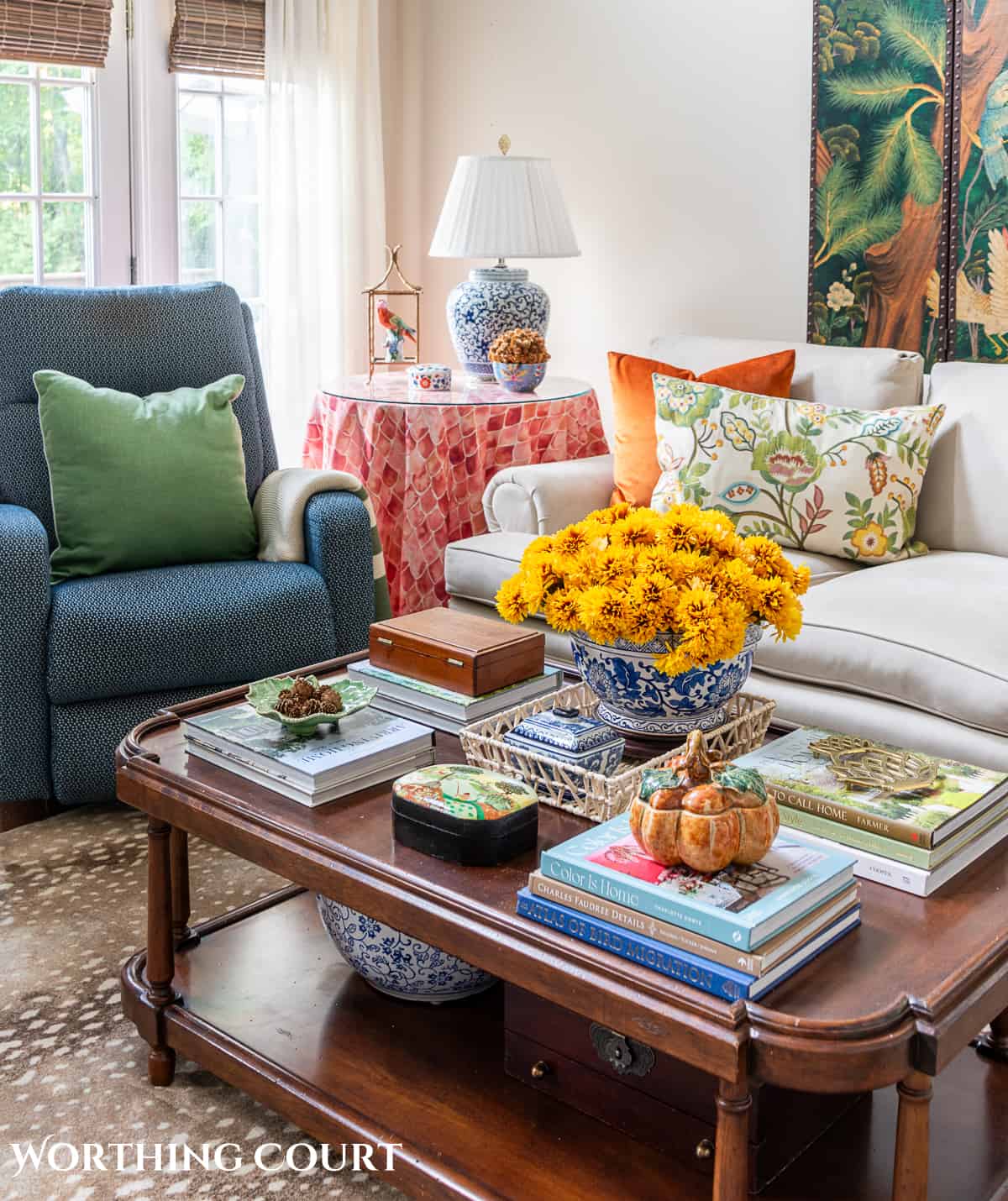 coffee table with books and fall decorations