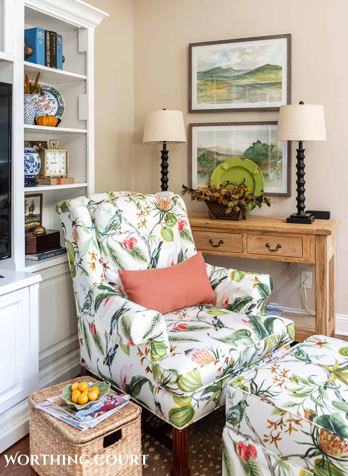 floral upholstered chair beside table with diy fall decorations