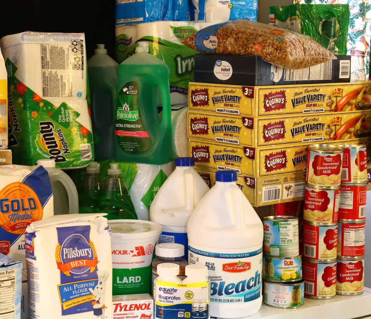 varitety of food and cleaning supplies in a well stocked pantry that has this home ready for the holidays
