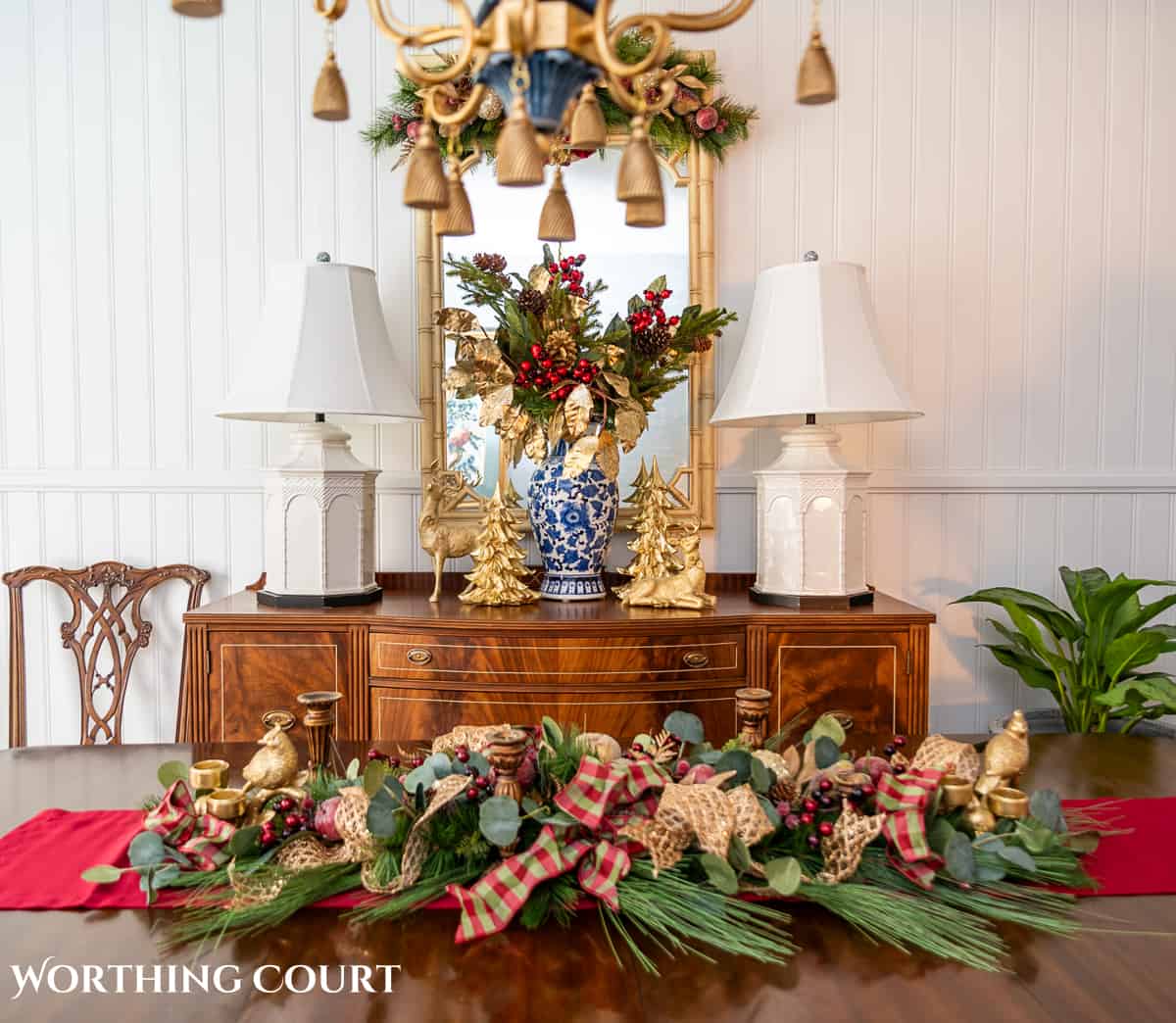 An elegant, but easy Christmas centerpiece made with faux greenery and sugared fruit swags. Includes green, burgundy and gold ribbon, gold candlesticks and white candles.