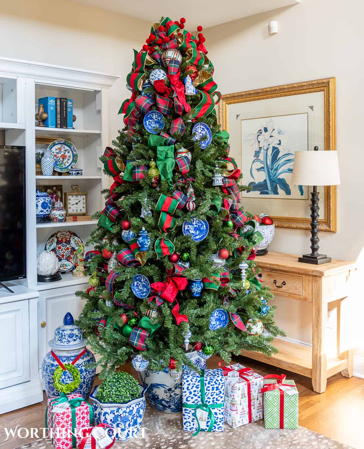 Christmas tree with traditional decorations in red, green, blue and white in a chinoiserie planters