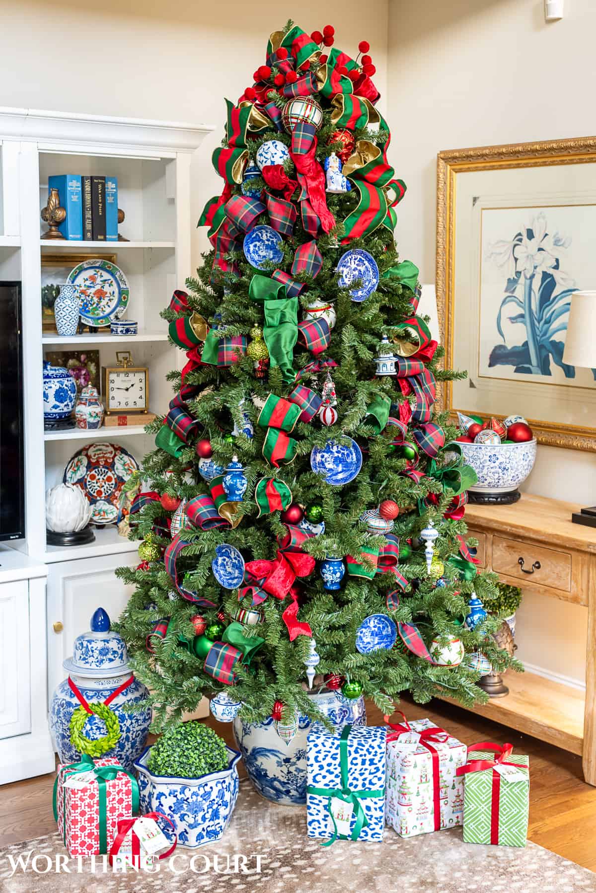 Christmas tree with traditional decorations in red, green, blue and white in a chinoiserie planters