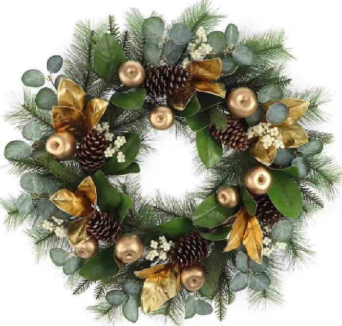 Christmas wreath with faux gold fruut and leaves and pine cones