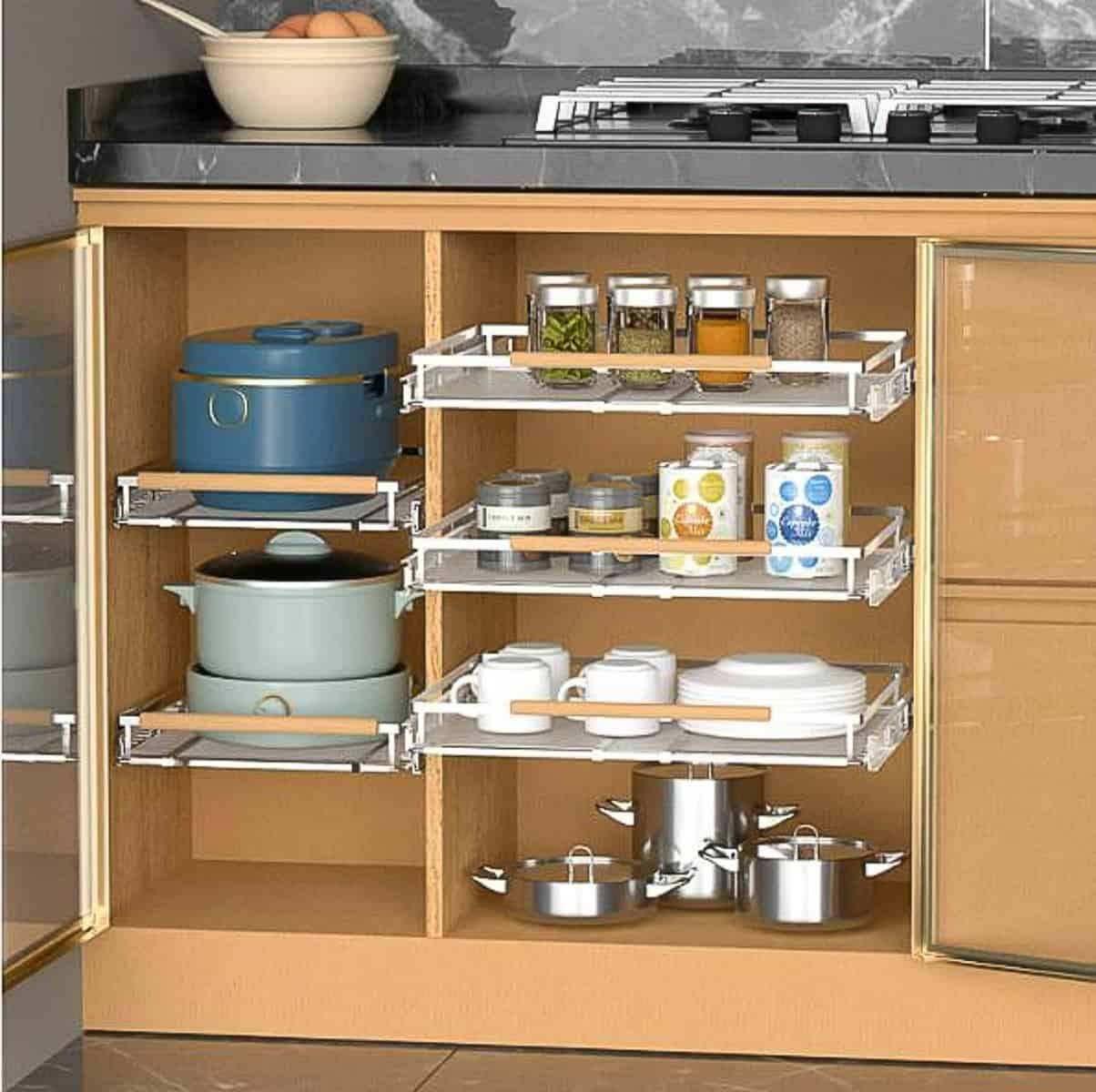 pull-ou storage system inside light wood toned kitchen cabinets