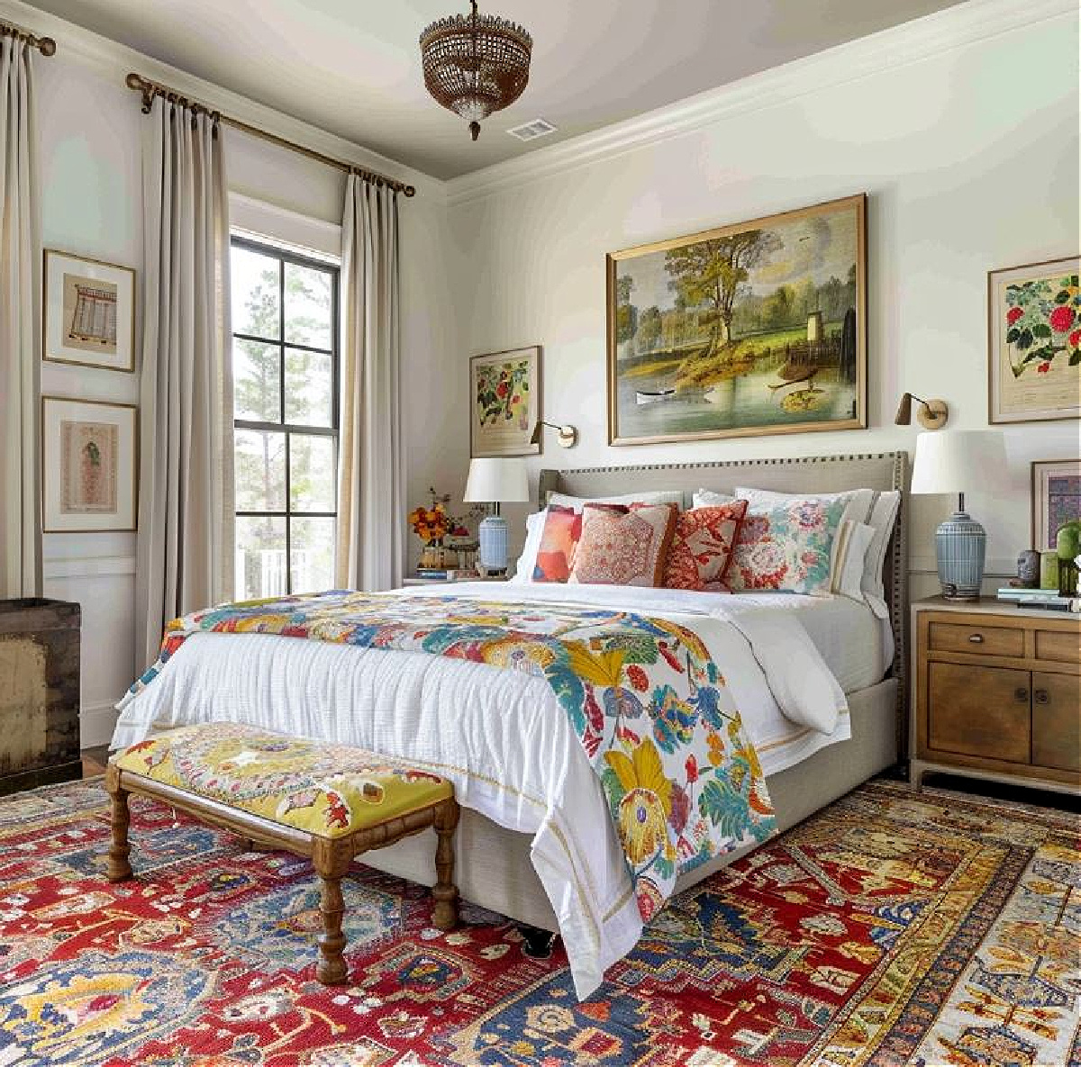 choice of an area rug in a colorful traditional pattern for a master bedroom