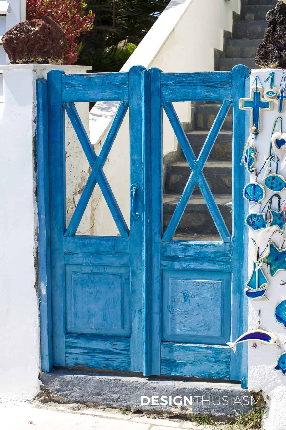 blue gate in a white wall