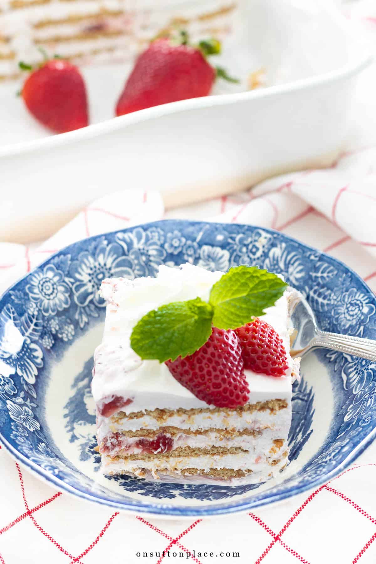 strawberries in a blue and white bowl
