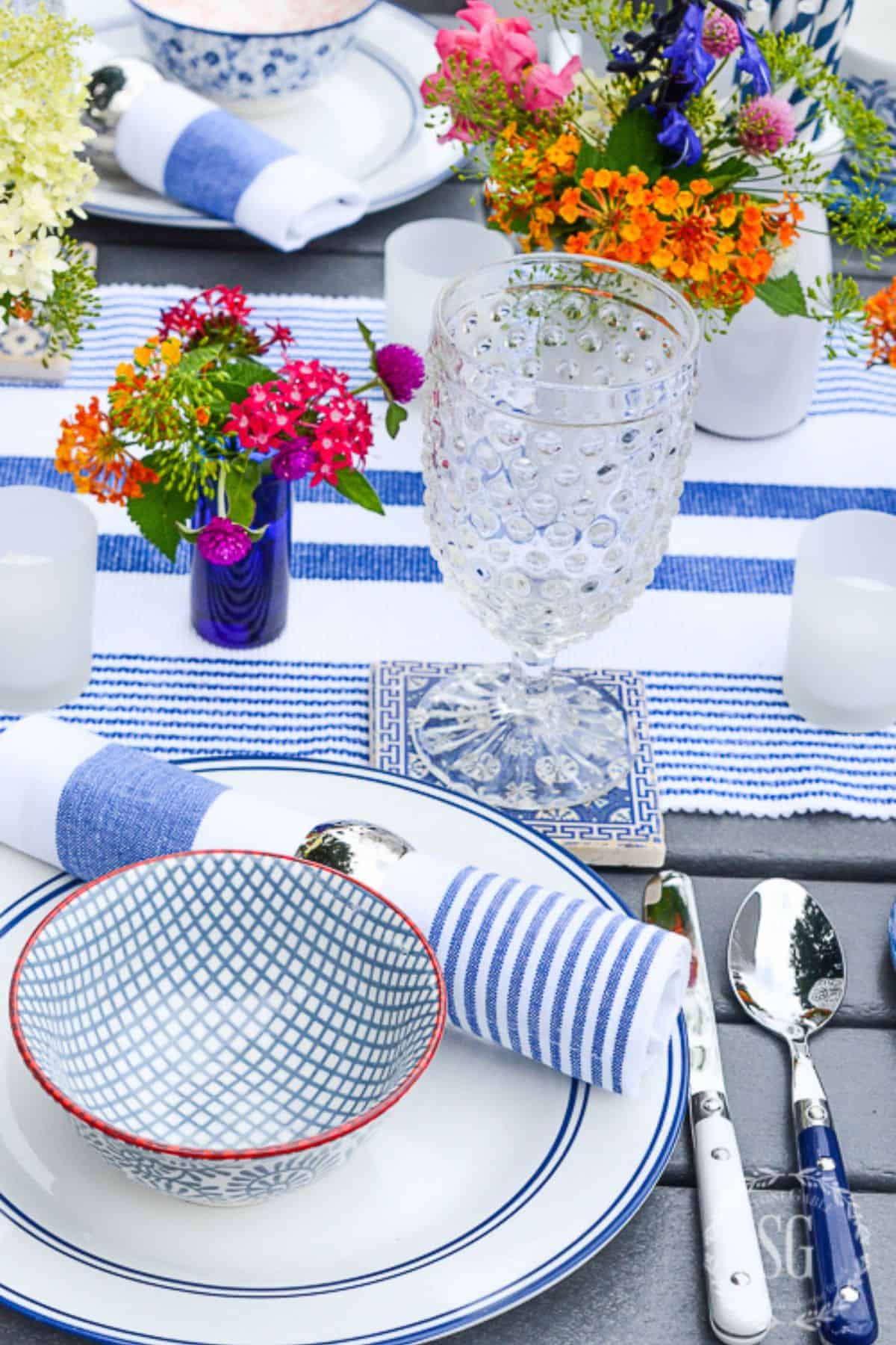 Summer tablescape with blue and white linens