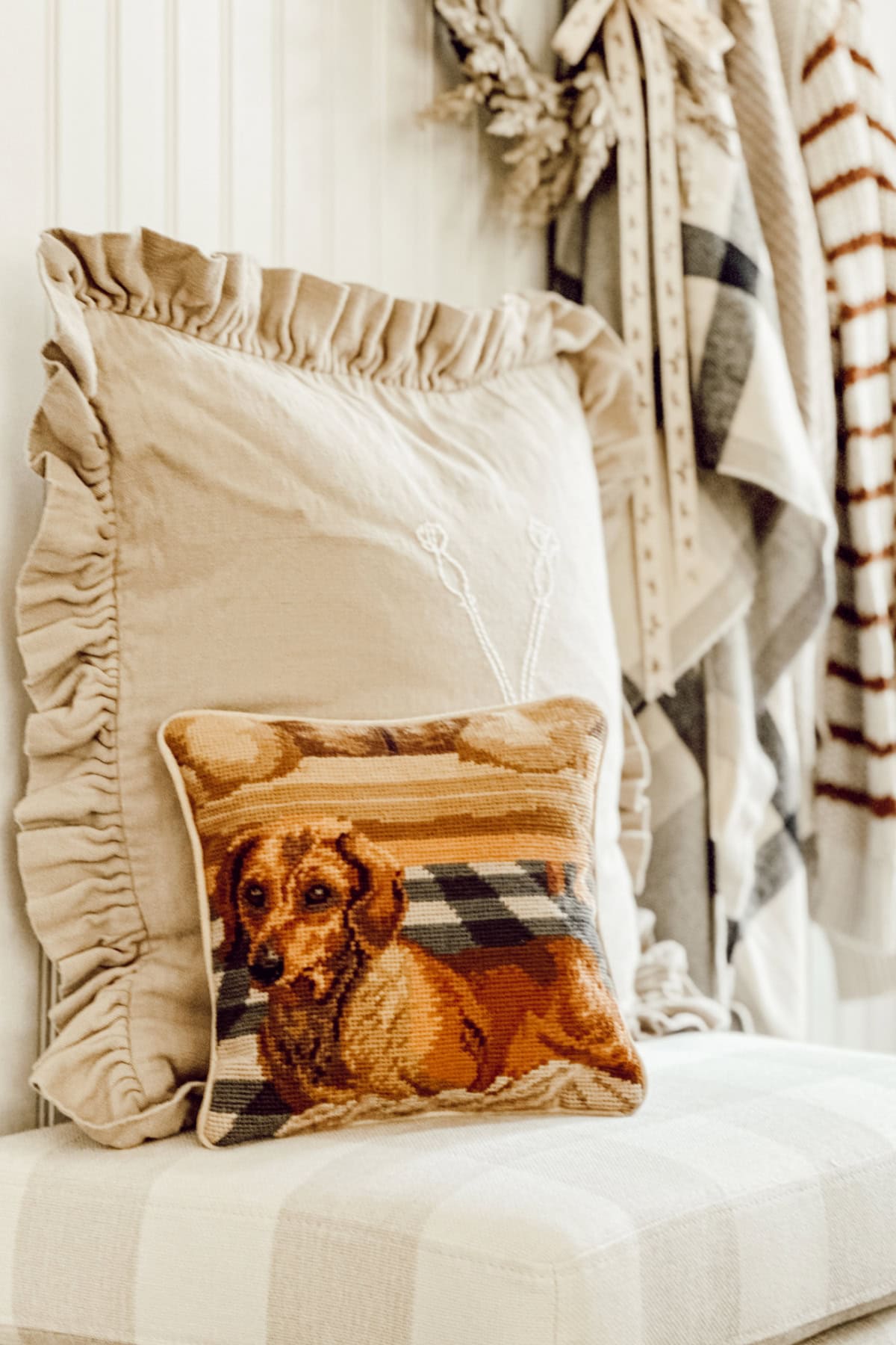 pillows on a buffalo check covered chair