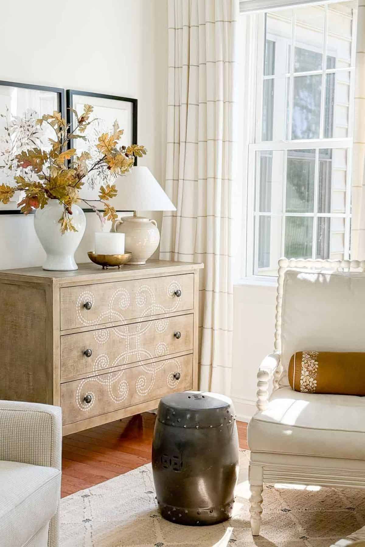 neutral decor, draperies, and furnishings in a corner of a living room