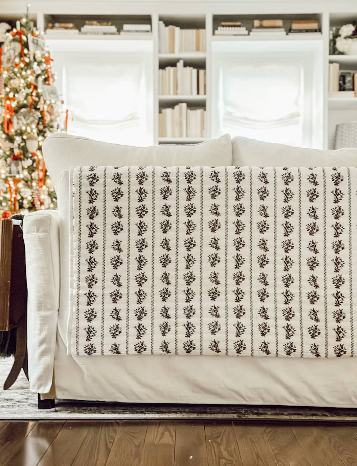 Bright, festive living room decor with holiday accents and timeless furniture.
