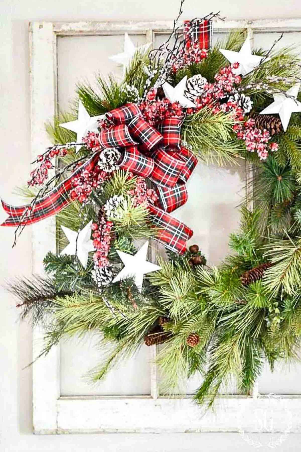 evergreen Christmas wreath with a plaid bow