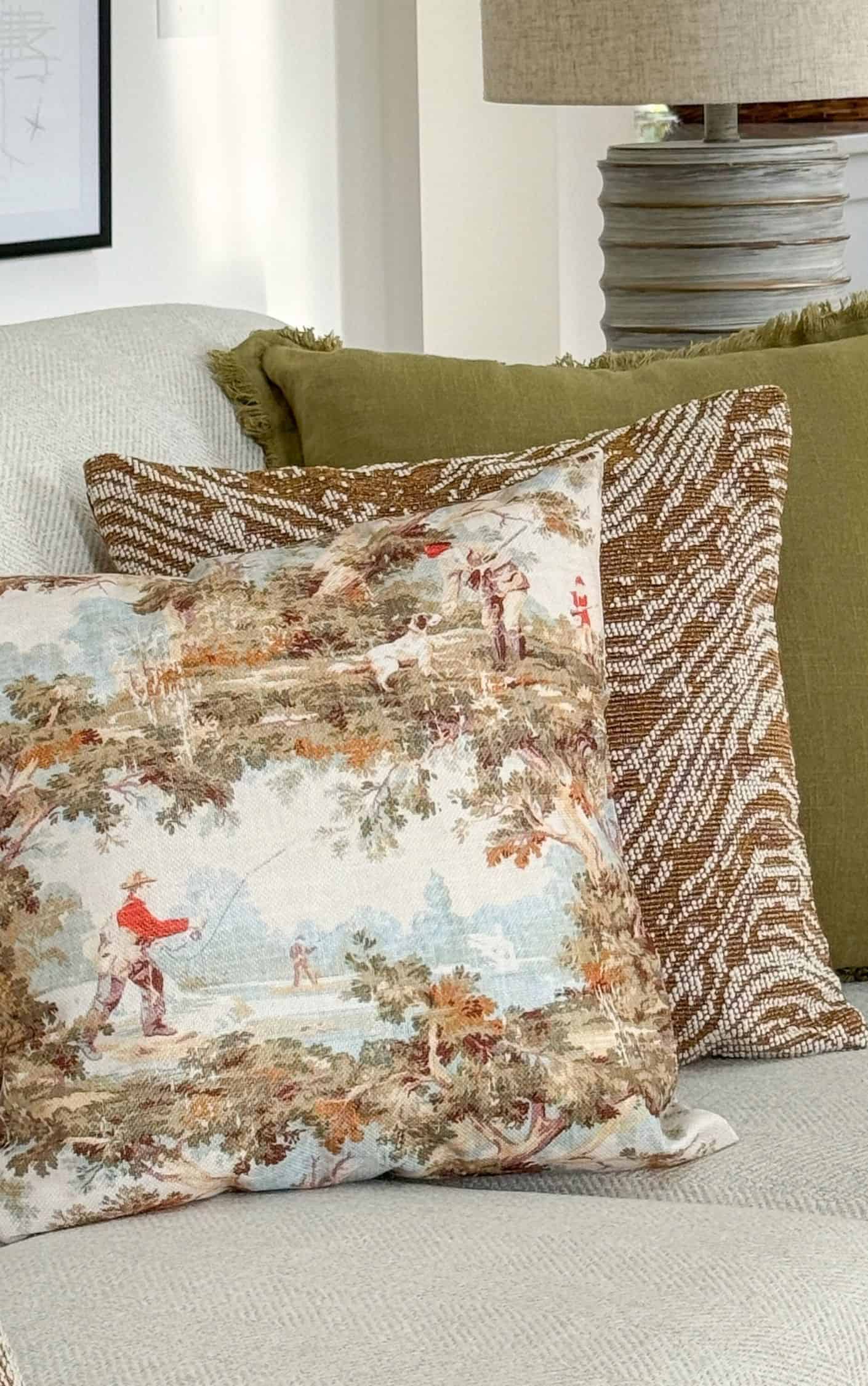 trio of brown and neutral pillows closeup