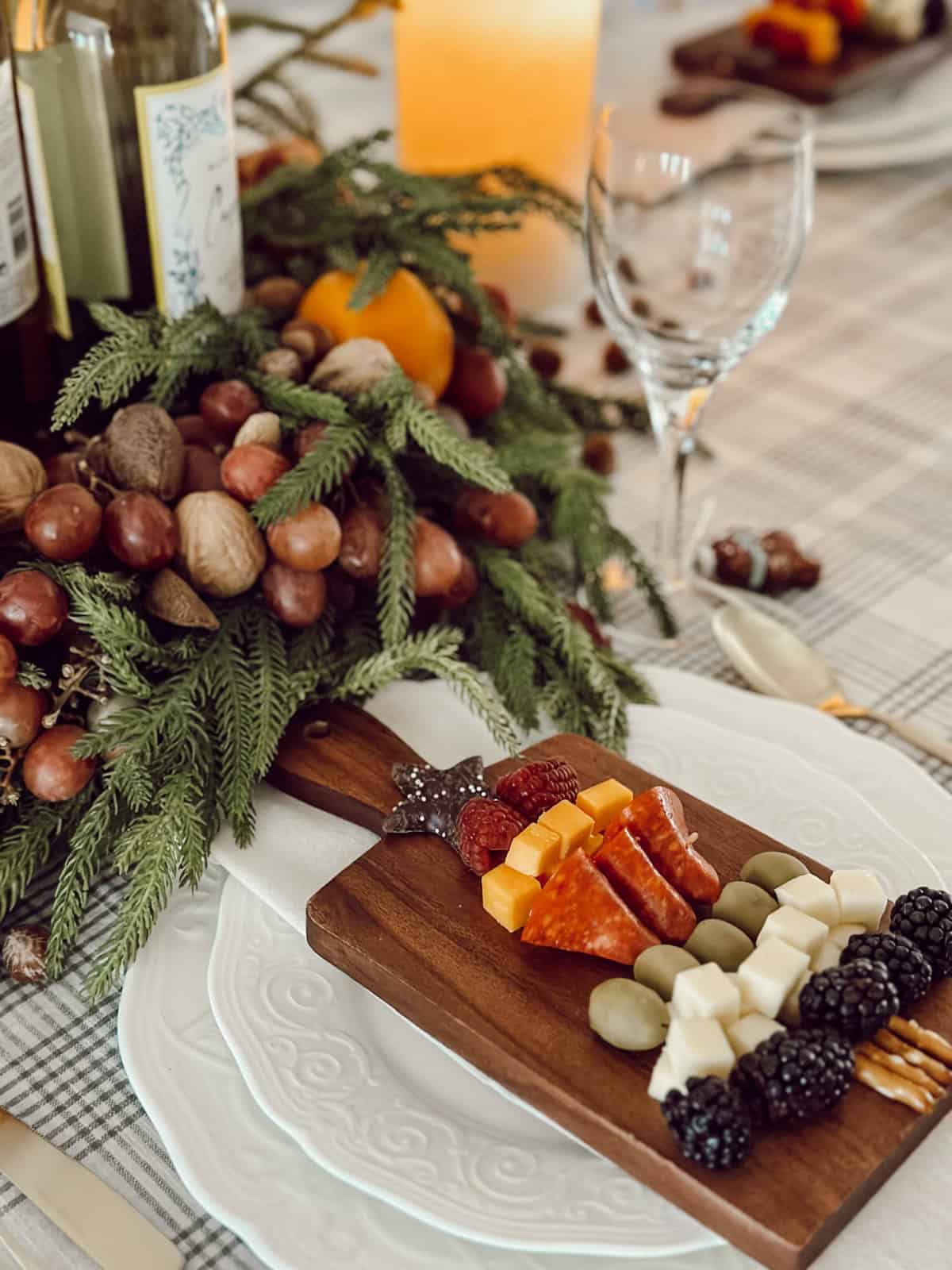 greenery beside a cheese tray