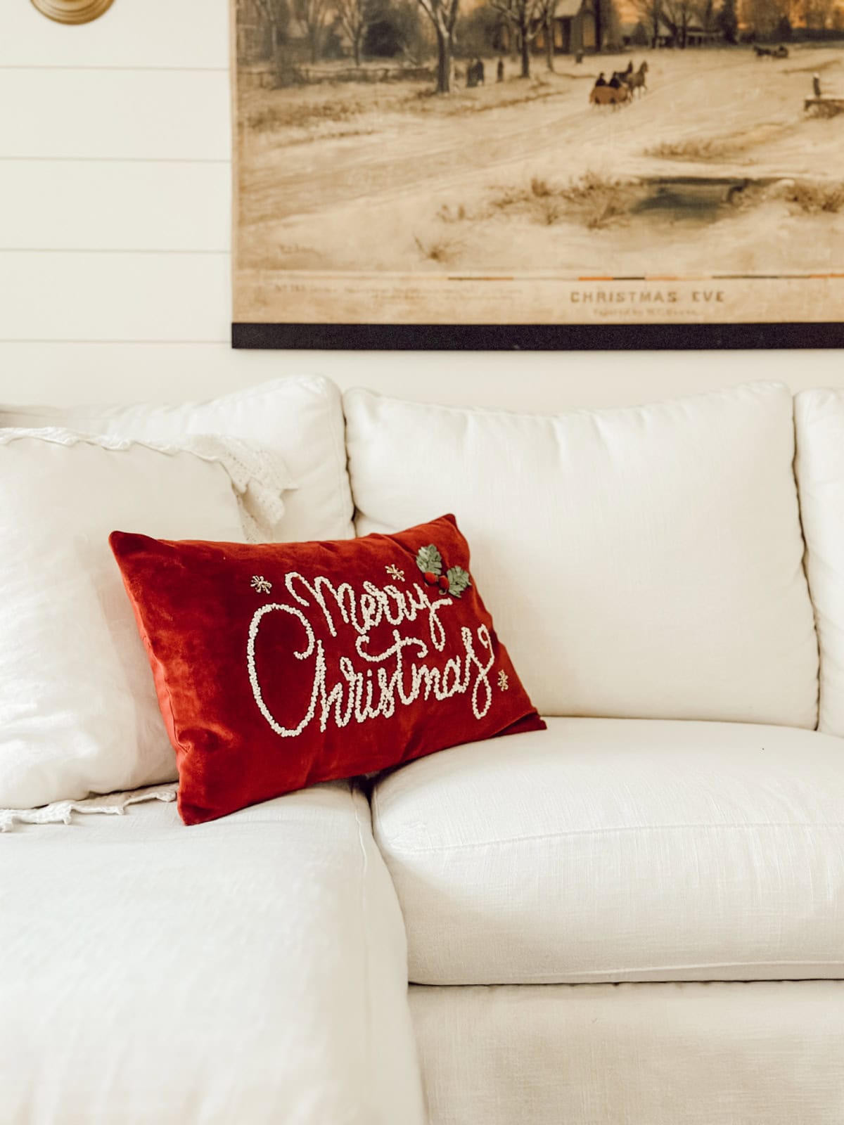 Christmas pillow on a white sofa