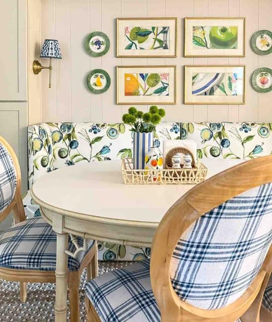 banquette area of a colorful breakfast area with colorful fabrics and accessories