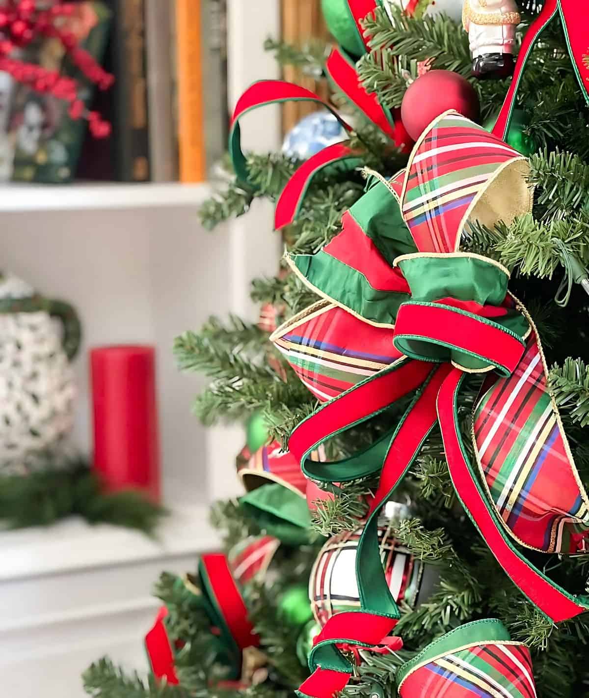 Traditional red and green ribbon on a Christmas tree